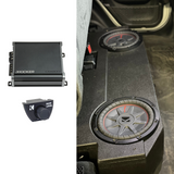 Installed BRP JT Gladiator underseat enclosure with Kicker subwoofer in a Jeep, with a picstiched image of the Kicker mono amplifier on the left