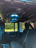 Black American Soundbar with black charcoal grilles and aqua lighting, installed in a Jeep JL/JLU/JT, part of the American Soundbar Kicker Kit.