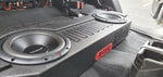 Close-up view of the BRP JT Jeep Gladiator underseat enclosure with two Rockford Fosgate 10-inch subwoofers installed, fitted under the rear seat for enhanced bass performance