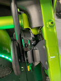 Close-up of the roll bar mounted flush on the stock back roll bar and securely connected to the seat belt bracket in a JLU Jeep Wrangler.