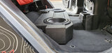 Side view of the BRP JT Gladiator underseat subwoofer enclosure with two Rockford Fosgate 10-inch subwoofers, fully visible without the seats installed